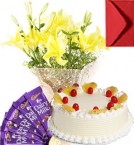 send Eggless Pineapple Cake Lilies Bouquet N Chocolate delivery