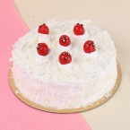 send yummy half kg white forest cake delivery