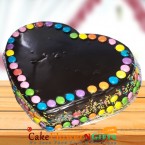 send 1Kg cadbury games chocolate truffle cake heart shape delivery