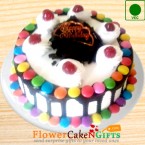 send Eggless 1Kg Cadbury Gems Black forest Cake Round Shape delivery