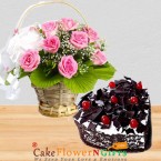 send 1kg eggless heart shape black forest cake n Pink roses basket delivery
