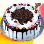 send Eggless Half Kg Cadbury Gems Black forest Cake Round Shape delivery