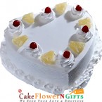 send eggless half kg pineapple heart shape cake delivery