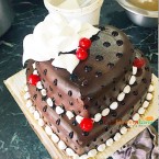 send 3 kg 2 tier step heart shape chocolate cake delivery