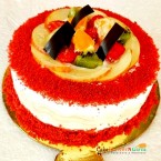 send  half kg red velvet fruit cake round shape delivery