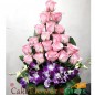 21 pink roses and 3 orchid designer bouquet