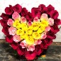 red pink yellow roses heart shape arrangement