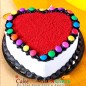 half kg eggless red velvet heart shape gems cake
