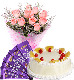 send Eggless Pineapple Cake Pink Roses Bouquet N Chocolate delivery
