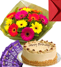 send Eggless Butterscotch Cake Gerbera Bouquet N Chocolate delivery