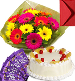send Eggless Pineapple Cake Gerbera Bouquet N Chocolate delivery