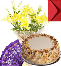 send Eggless Butterscotch Cake Lilies Bouquet N Chocolate delivery