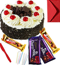 send Eggless Black Forest Cake with Chocolate gift pack n Greeting Card delivery