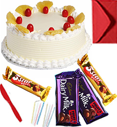 send Eggless Chocolate Pineapple Cake with Chocolate gift pack n Greeting Card delivery