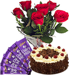 send Half Kg Black Forest Cake with Red Roses Bunch n Chocolate delivery