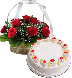 send  Pineapple Cake Half Kg N Red Roses Basket delivery