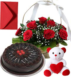 send Chocolate Cake Half Kg Roses Basket N Teddy Gifts delivery