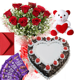 send 1Kg Heart Shape Black Forest Cake Roses Bouquet Teddy N Chocolate Combo delivery
