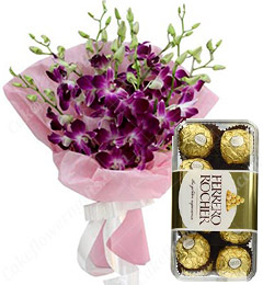 send orchids bouquet with ferrero rocher chocolate delivery