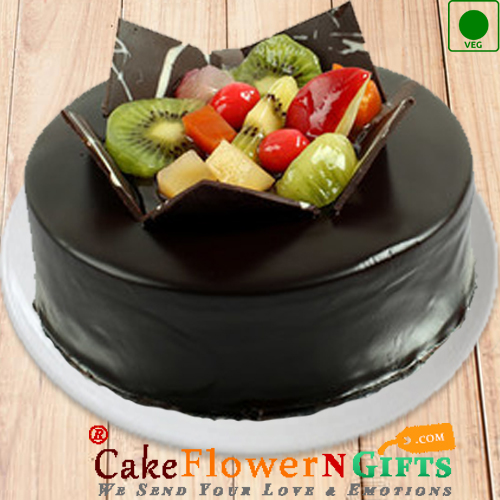 send Half kg chocolate Truffle fruit eggless cake delivery