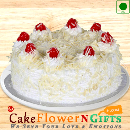 send Half Kg Eggless White Forest Cake delivery