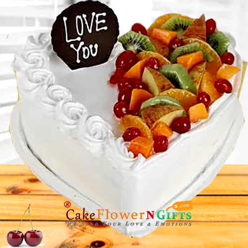 send half kg heart shaped vanilla fruit cake delivery