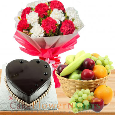 send half kg heart shape chocolate cake 3 kg fresh fruit basket n Carnation bouquet delivery