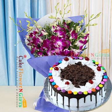send half kg black forest gems cake and orchid bouquet delivery