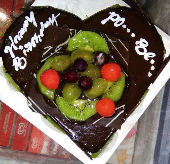 half kg eggless chocolate fruit cake heart shape cake