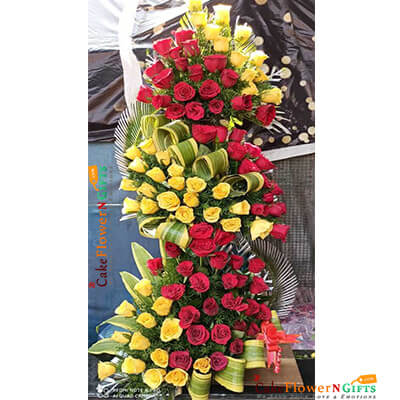 send 100 red yellow  roses premium arrangement delivery