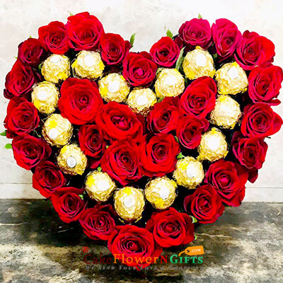 send 16 ferrero rocher chocolate 30 roses heart shape arrangement delivery