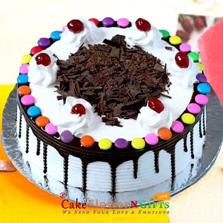 send Eggless Half Kg Cadbury Gems Black forest Cake Round Shape delivery