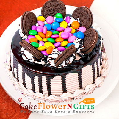 send half kg eggless delicious oreo gems cake delivery