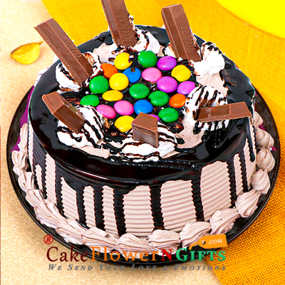 send half kg chocolate overload kitkat gems drip cake delivery