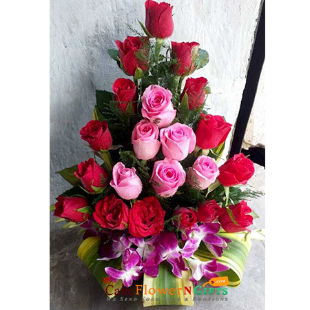 21 pink red roses 3 purple orchids in basket