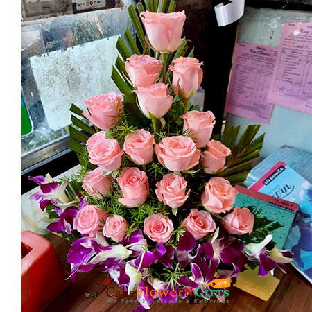 send 21 pink red roses 4 purple orchids in basket delivery