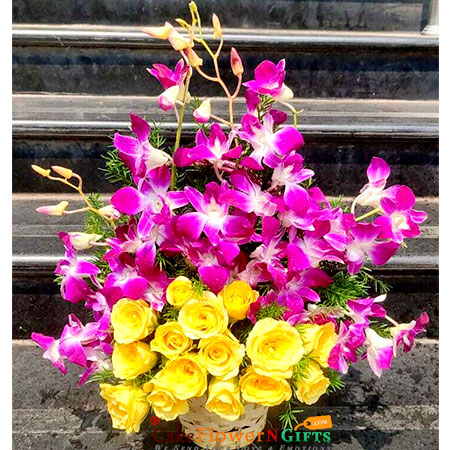 send 12 yellow roses 12 purple orchids in basket delivery