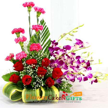 send 7 Red Roses 8 Pink Carnations 6 Purple Orchids in Basket delivery
