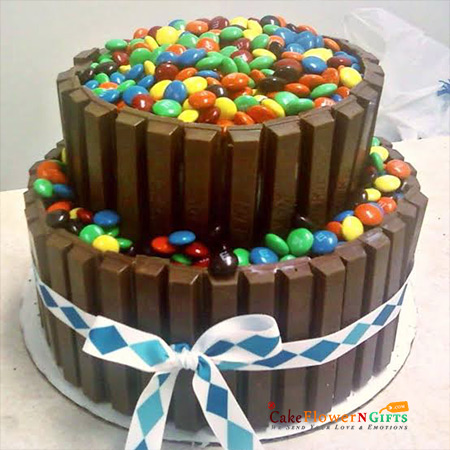 send 3 kg 2 tier chocolate kitkat  gems cake delivery