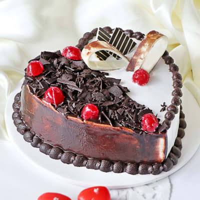 send half kg eggless choco vanilla cake heart shape d2 delivery