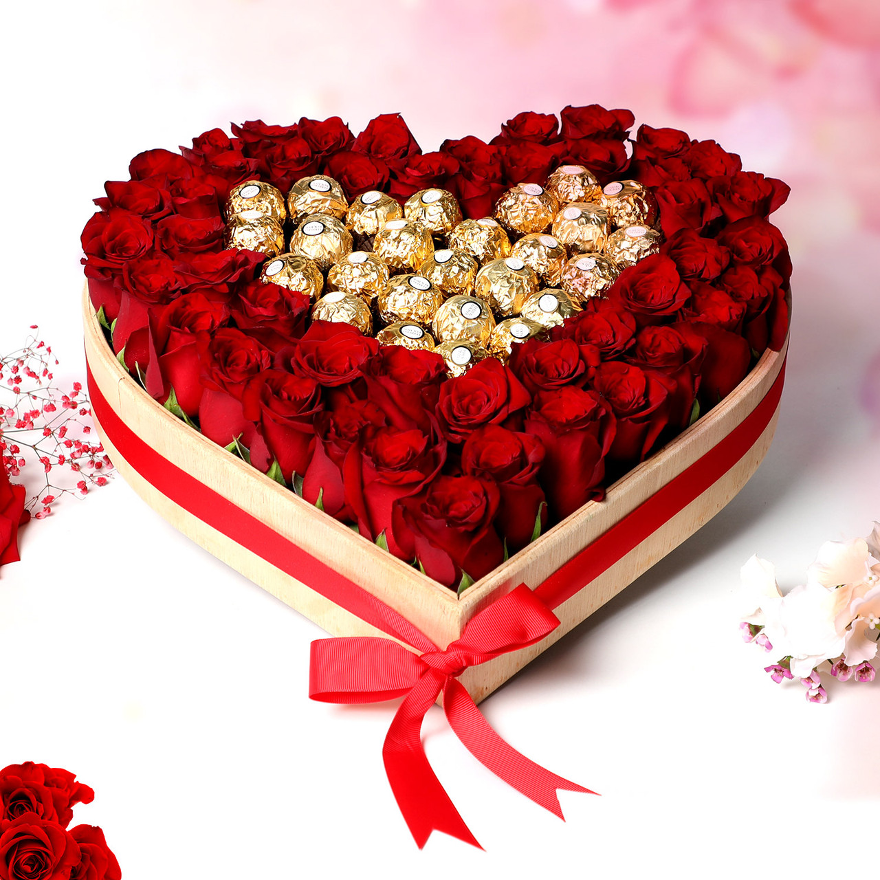 send  26 Ferrero Rocher 50 Red Roses heart shape arrangement delivery