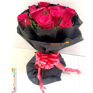 red roses with black paper packing bouquet