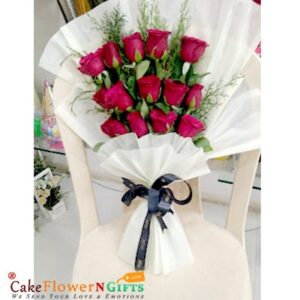 14-red-roses-white-paper-packing-bouquet