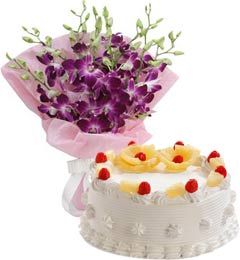 eggless birthday -Eggless-Pineapple-Cake-Half-Kg-N-Orchids-Bouquet home delivery