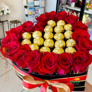 28 red roses with 16 ferocher chocolate heart shape arrangement
