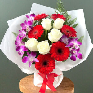 5 red gerbera 5 white roses 3 Orchids bouquet