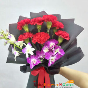7 red carnation 3 Orchids bouquet