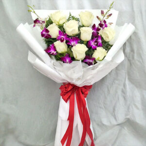 9 white roses 4 Orchids bouquet