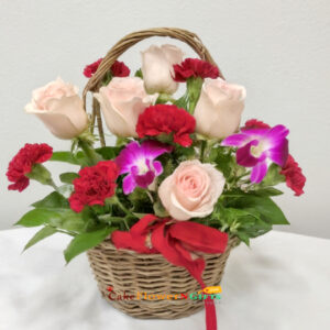 pink roses red carnations purple orchid basket